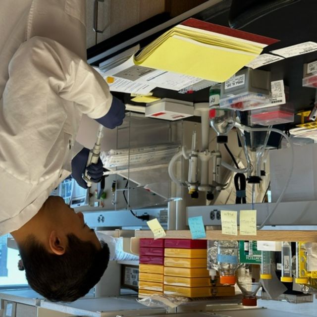 Scientist in Raghu Mirmira&#039;s lab using a pipette